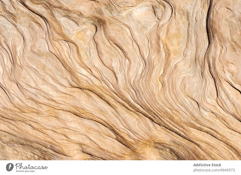 Sandstone wall of canyon cliff sandstone surface uneven texture background little wild horse canyon utah usa united states america daytime formation natural