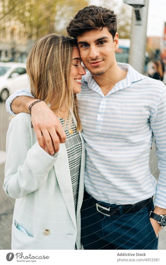 Stylish couple hugging in city style embrace relationship love together romantic smile affection happy close trendy carefree partner stand cuddle boyfriend