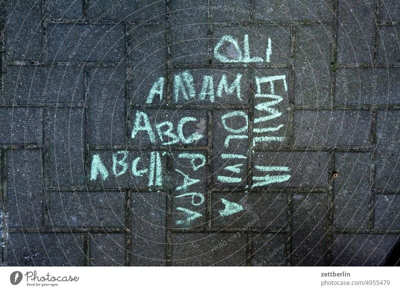 Oli, Anam, Mom, Dad, Emilia, Olivia, ABC botschy letter single letter Family info Information Chalk Wall (barrier) Message message Name pavement painting leap