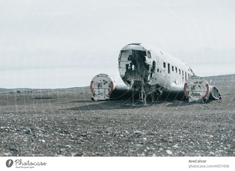 Landscape with copy space of crashed airplane in Iceland, on the beach of Sólheimasandur. Moody ambient social network image. Travel to Iceland, road trip concept. Copy space image, visit Iceland.