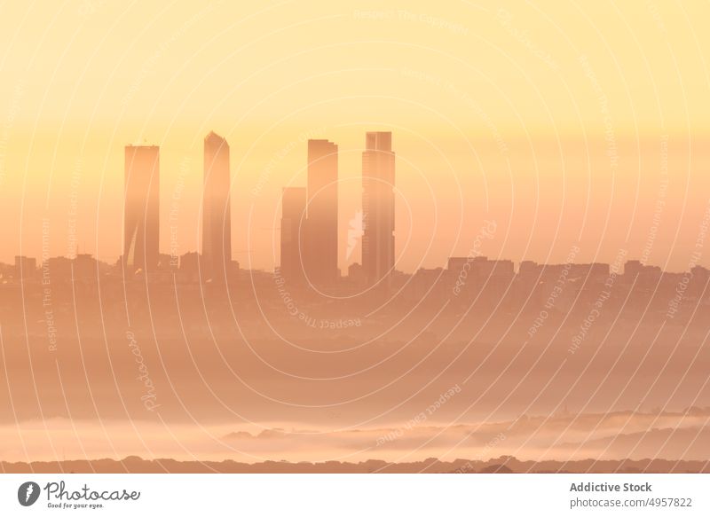 Silhouettes of skyscrapers at sunrise in city silhouette morning cityscape dawn building metropolis megapolis madrid spain cuatro torres business area