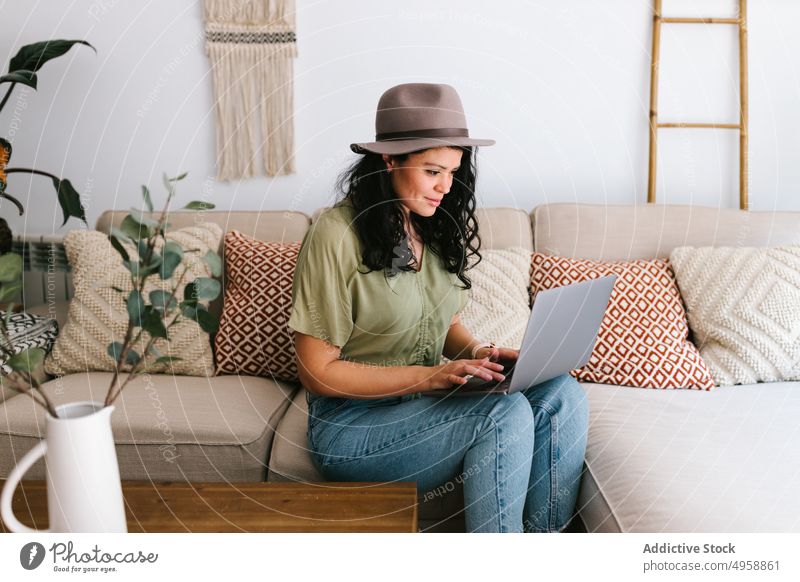 Hipster woman working at home with laptop technology hipster female computer internet communication business office lifestyle using online girl notebook