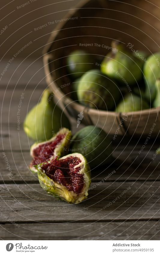 Fresh delicious figs in closeup red green organic food raw juicy vitamin seed pile ingredient diet fresh sweet health fruit ripe vibrant tropical exotic vegan