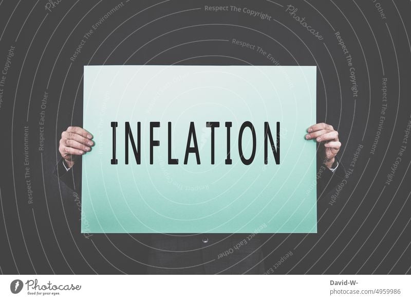Inflation - man with sign in hands inflation Man Signage Economy Business To hold on Crisis finance broke concept Word Energy crisis
