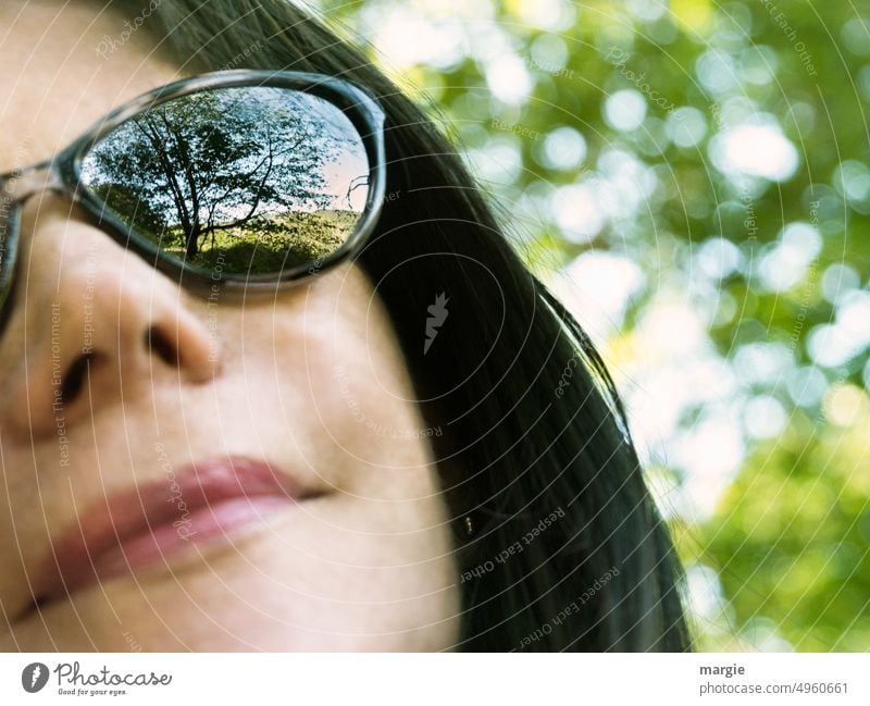 Find peace! A relaxed woman with sunglasses in the forest Woman Sunglasses Forest Tree Exterior shot Nature Adults trees Environment Green Forest walk Face Nose