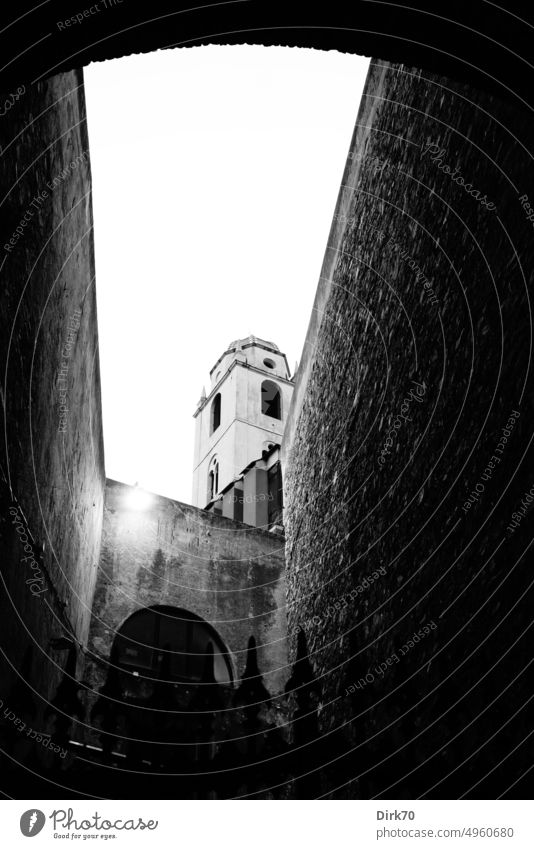Church and fortress walls in Genoa, black and white photo Tower Spire Church spire Religion and faith Architecture Sky Exterior shot Tourist Attraction Building