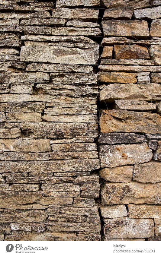 2 adjacent natural stone walls Dry stone walls, fieldstone. Full size. Book cover Stone wall Natural stone wall Dry stone walling stones full-frame image