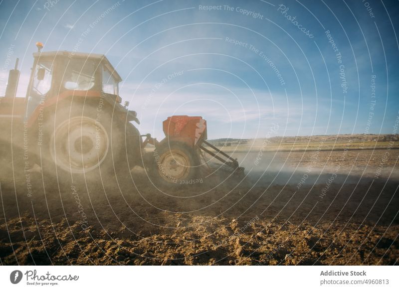 Old tractor working on the field agriculture agro countryside cultivation farm harvest land machine outdoor plant plow rural rustic rye sky sunny Tractor