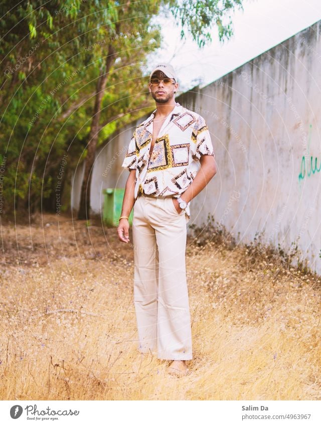 Stylish man standing in a field Field fields Style styled styler styles stylish Stylist Styling stylized Fashion fashionable Fashioned Fashion Model fashionista