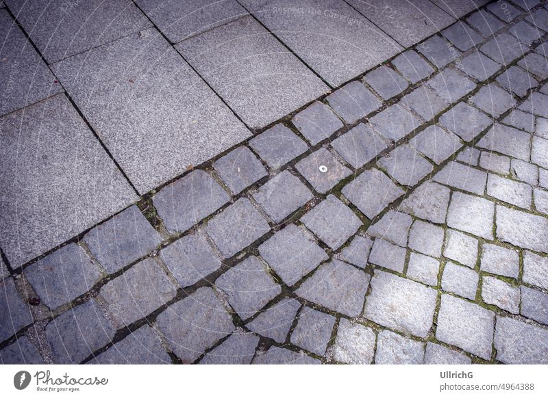 Urban background of pavement and cobble stones in a street. sidewalk alley lane urban structure pattern texture minimalist graphical simple material