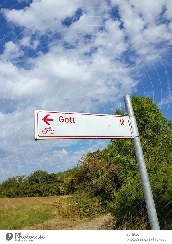 Way to God | only 18km by bike, who would have thought ? sign Road marking Belief Direction Orientation Arrow Signs and labeling Clue Signage Navigation