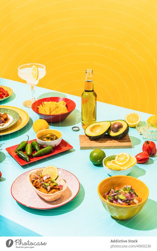 Table with assorted Mexican food and drinks tradition table composition dish cuisine colorful bright mexican nacho salad chicken fried gourmet bowl yummy serve