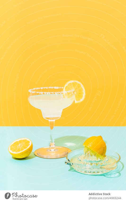 Fresh lemonade on colorful background fresh drink bright jug glass citrus beverage cool cold mexican tradition fruit refreshment juice slice vitamin healthy