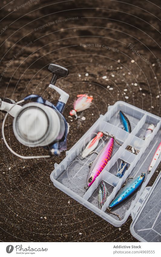 Fishing tackle on ground in countryside - a Royalty Free Stock Photo from  Photocase