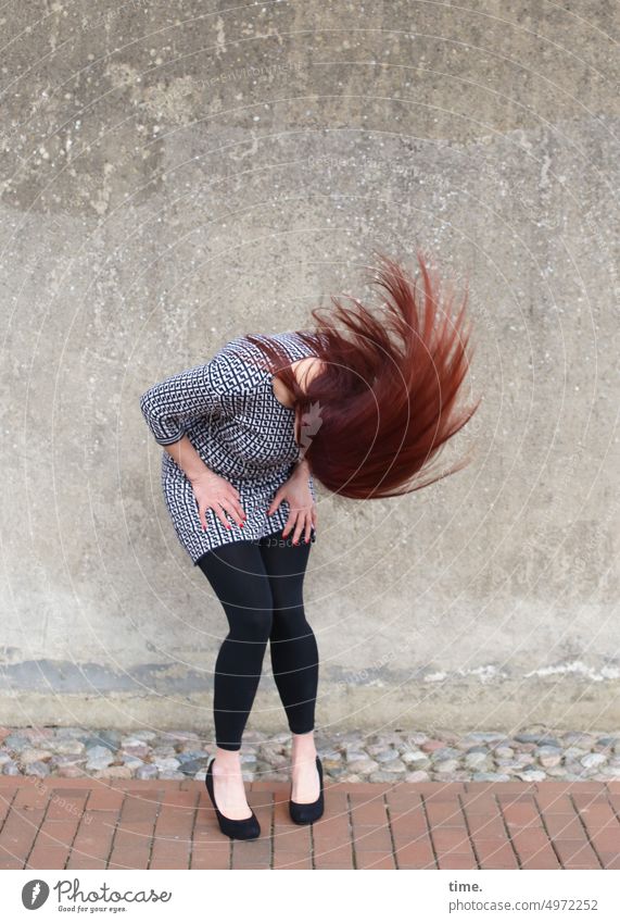 woman in motion Feminine Woman Dancer Wall (barrier) Wall (building) Hair and hairstyles Red-haired Long-haired Movement Rotate Emotions Joy