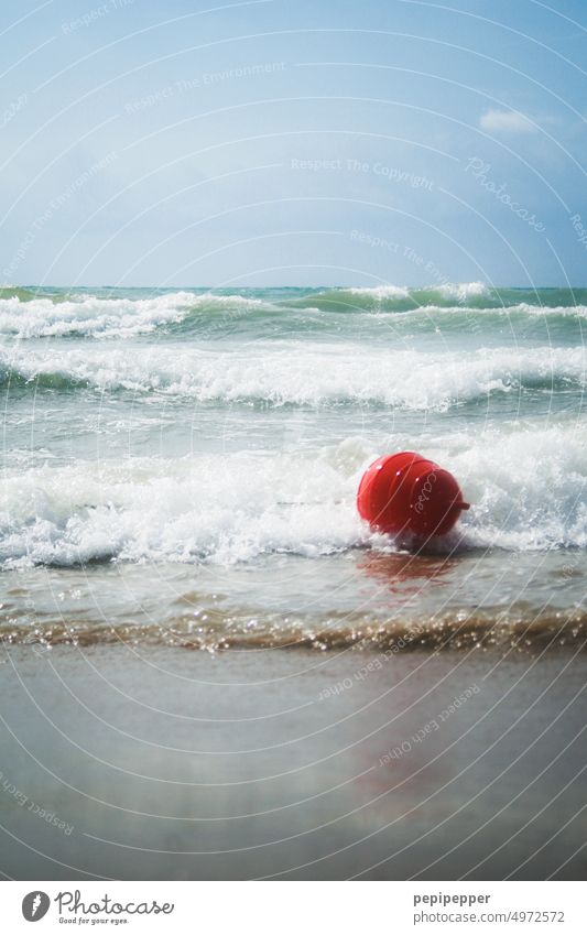Red buoy in water Buoy Water Ocean Waves Blue Vacation & Travel Summer vacation Tourism Swimming & Bathing Beach coast Exterior shot Colour photo Sand Sky