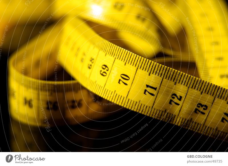 Putting on weight again... Centimeter Millimeter Diet Unit of measurement Tape measure Yellow Depth of field Digits and numbers Nutrition Measuring instrument