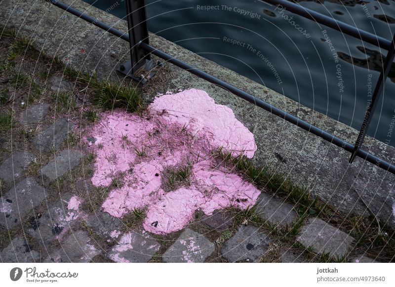 huge pink paint stain on cobblestones Colour conspicuous Ground floor Patch Dirty Gaudy gaudy color unexpected Cobblestones rail Channel Water Vomit filth