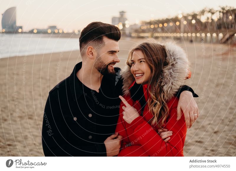 young romantic couple laughing love smiling dating winter guy girl people friends happy woman boyfriend cold girlfriend fun outdoors good husband beautiful