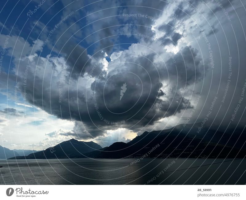 Thunderstorm over Lake Como Thunder and lightning Storm Clouds Exterior shot Sky Nature Landscape Deserted Water Storm clouds Weather Rain Threat Dark Light