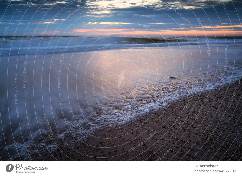 Waves on North Sea beach in the evening Evening Sunset Clouds Denmark motion blur Sand Ocean Horizon Wind vacation