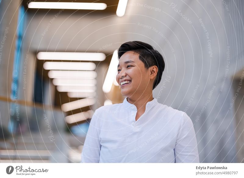 Portrait of a smiling young man in the office real people natural young adult city urban student positive smile cheerful career confident successful