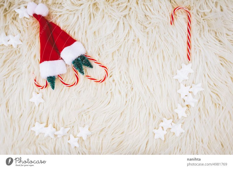 Colorful christmas images with santas hat, christmas trees and stars background winter decoration holidays eve party candy canes event fluffy soft snow season