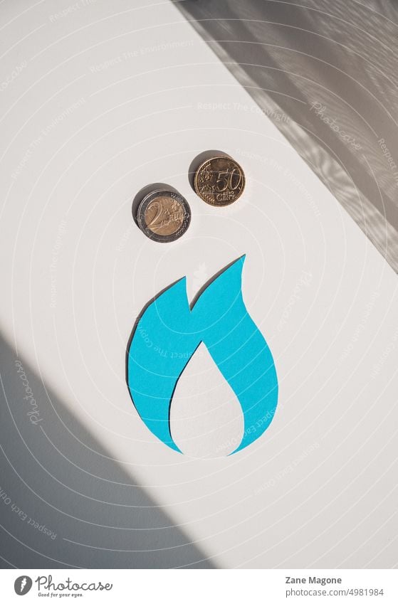 Natural gas symbol with euro coins, natural gas price concept gas consumption gas money saving natural resources gas economy saving gas saving resources debt