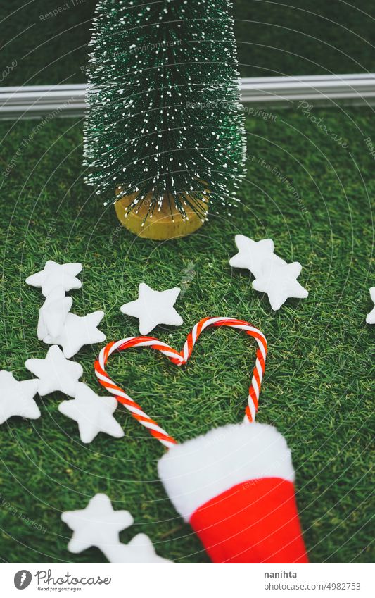 Classic christmas background with christmas tree, santas hat and other christmas toys winter holidays heart decoration green snow snowy eve event party classic