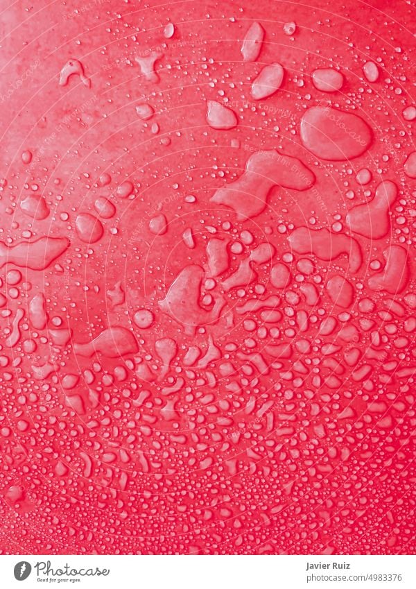 water drops of different sizes on a red surface, drops texture, rain on red tile, rain texture, red refreshing background, cherry wet textured, portrait bluish