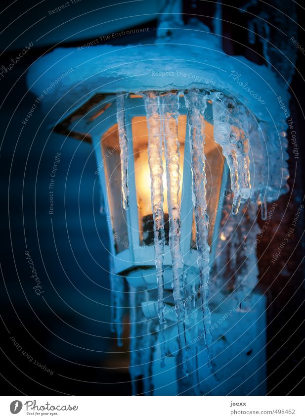 Appearance and Being Winter Ice Frost Snow Illuminate Bright Cold Blue Yellow Moody Hope Icicle Lamp Colour photo Multicoloured Exterior shot Close-up Deserted