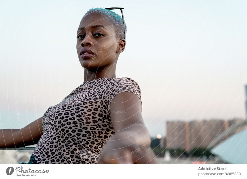 Stylish African American female with short hair woman african american stylish fashion leopard print beautiful young ethnic pretty attractive trendy fashionable