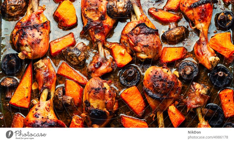 Grilled chicken legs with pumpkin meat roasted grilled squash poultry food drumstick fried barbecue meal tasty table delicious spicy baked prepared nutrition