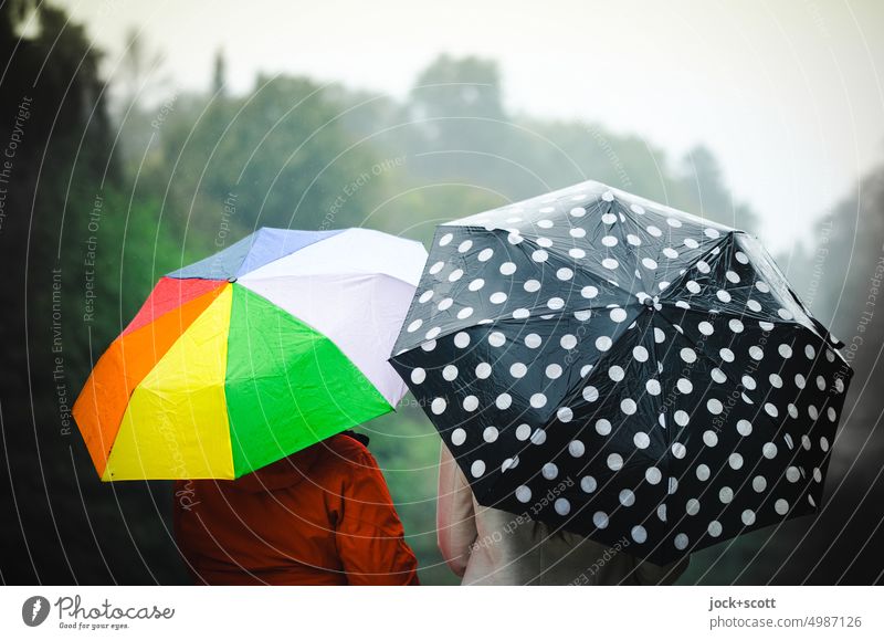 [HH Unnamed Road] colorful umbrella meets black with white dots Woman Rear view Adults Umbrella rainy points chill Damp Bad weather Lifestyle melancholy Autumn