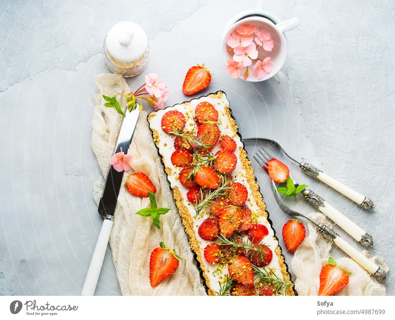 Home made strawberry not baked cheese cake ricotta background gray cream delicious fruit mint food sweet fresh home made pastry pie enamel tin summer dessert