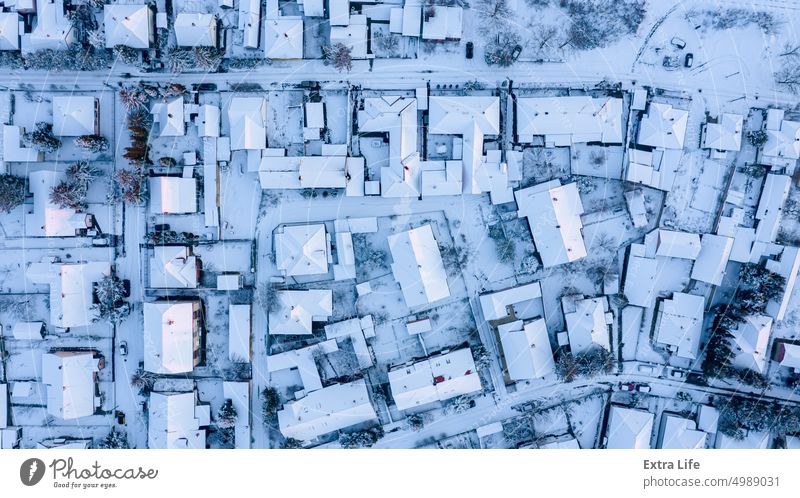 Aerial top view on cityscape covered with snow, appearance of the city in winter. Above Architecture Attic Building City Cityscape Climate Cold Complex