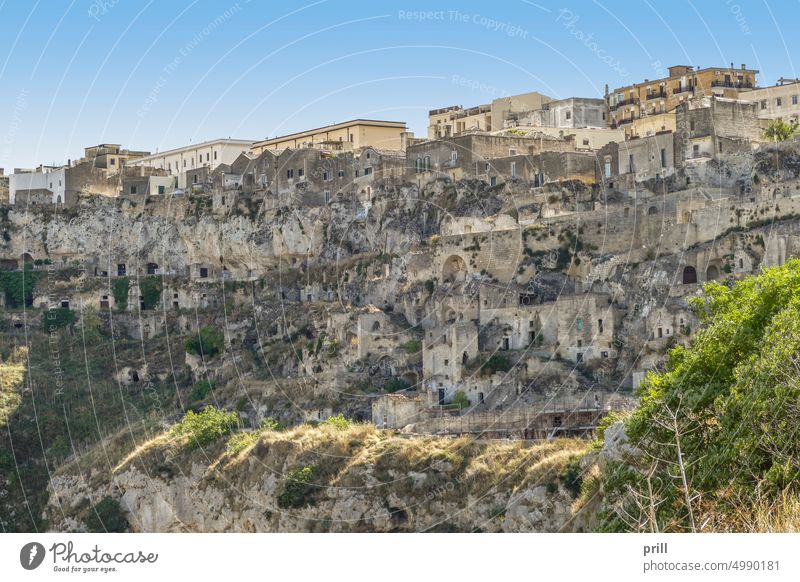 Matera in Southern Italy city basilicata italy southern italy old historic house building culture tradition summer sunny sassi di matera canyon cave dwelling