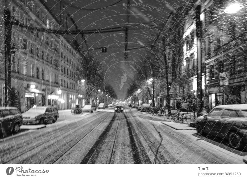 Winter night with snowfall Prenzlauer Berg b/w bnw Night chestnut avenue Berlin Snow Snowfall Capital city Town Downtown Exterior shot Black & white photo