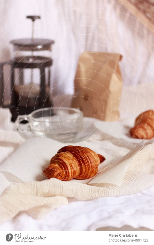 Croissants and coffee brewed in a french press coffee maker for a simple french breakfast French Press Coffee Maker Breakfast Wellbeing Foodie Caffeine Bread