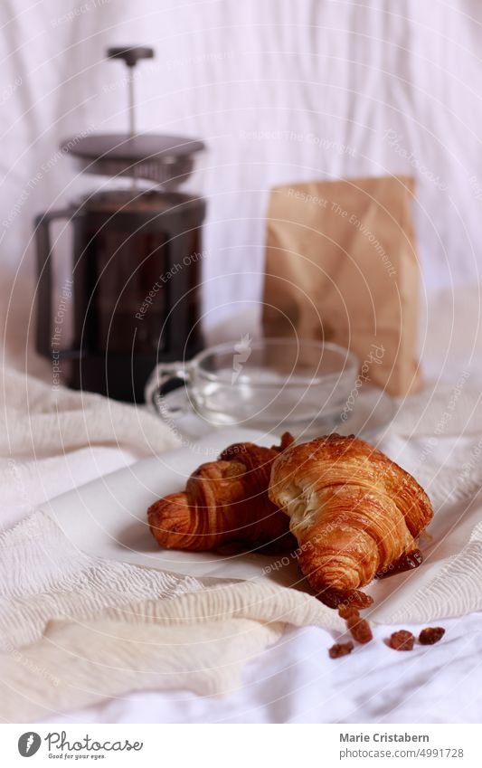 Croissants and coffee brewed in a french press coffee maker for a simple french breakfast French Press Coffee Maker Breakfast Wellbeing Foodie Caffeine Bread