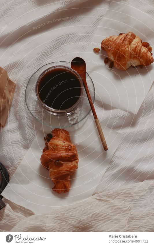 Vertical overhead shot of freshly baked croissants and black coffee for a simple french breakfast Croissant Simplicity Autumn Wellbeing Foodie Caffeine Snack