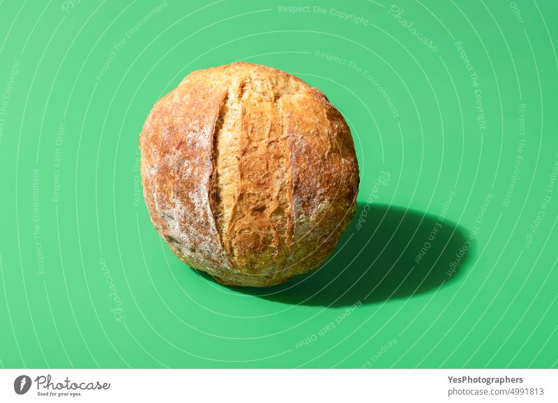 Homemade bread on a vibrant green background above artisan baked bakery bright brown carbs close-up color crust cuisine delicious food fresh golden gourmet