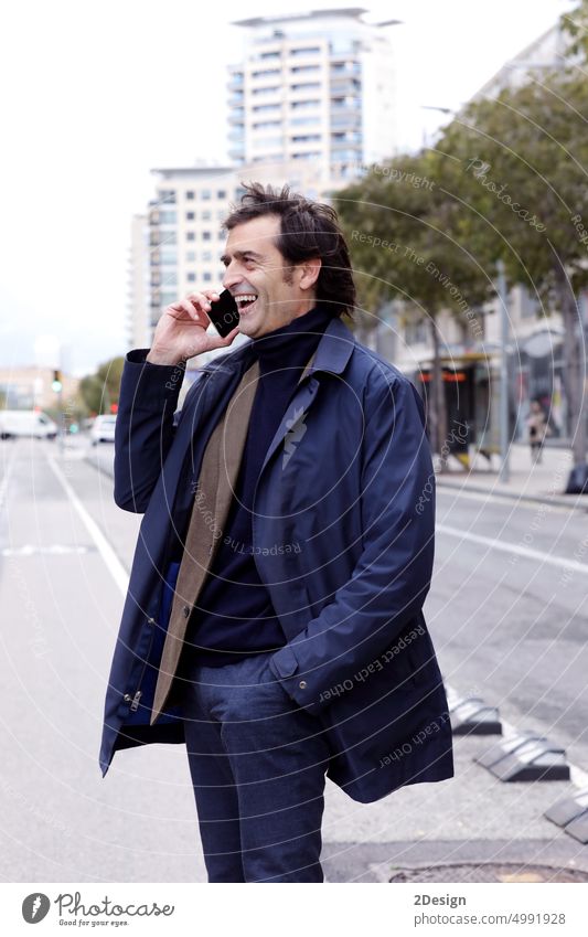 Smiling senior man, businessman talking on the phone while walking around the city, person outdoor mature street smartphone male adult urban standing confident