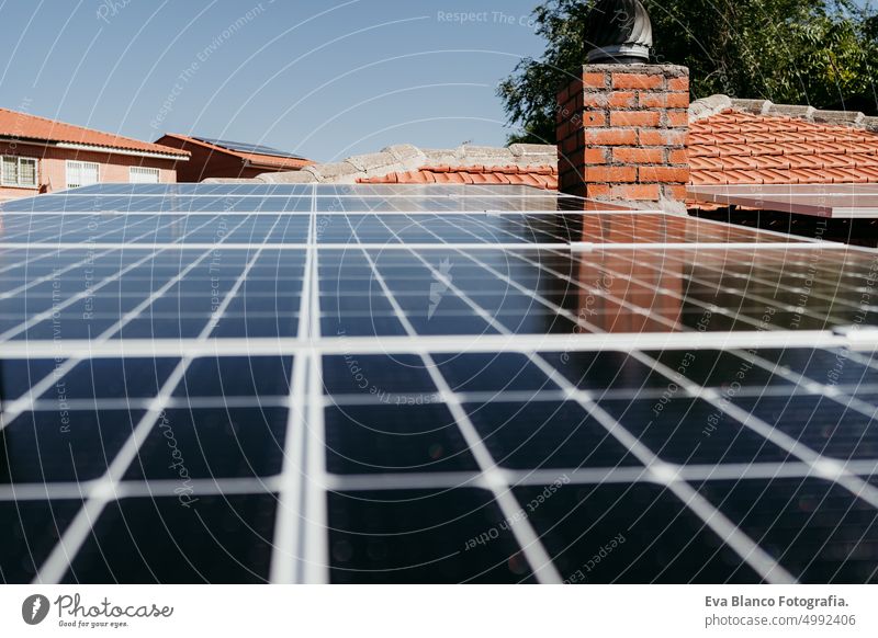 solar panels on roof during sunrise.Renewable energies and green energy concept house water drops daytime landscape plant exterior technology field country old