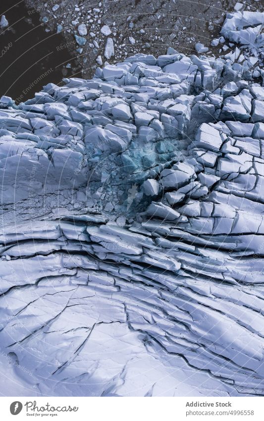 Scenic volcanic terrain with textured glacier ice frozen winter background massive formation nature surface rough crack vatnajokull iceland weather north