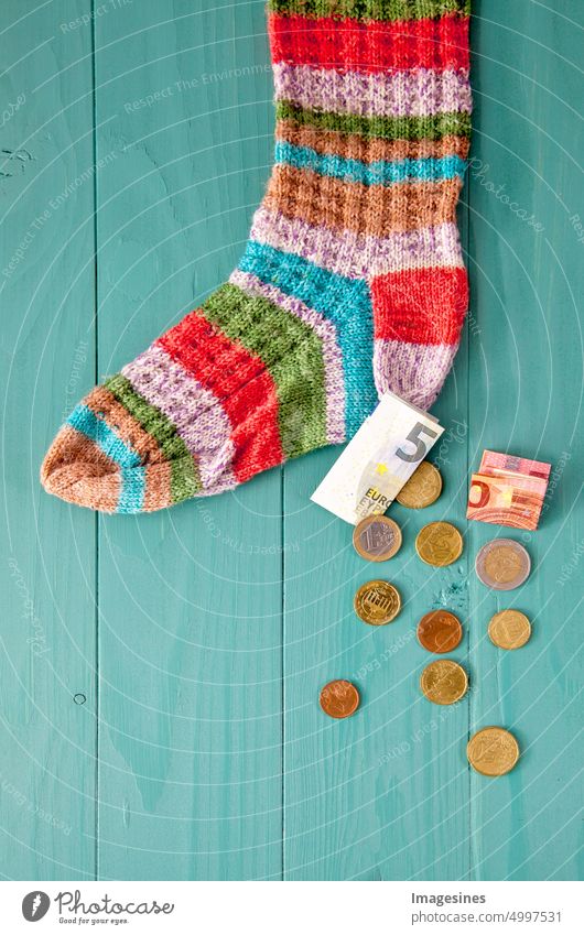 stocking for saving Pension provision Hide concept Money sock deposit Coins Wool socks banking budget business Christmas Christmas stocking garments coin
