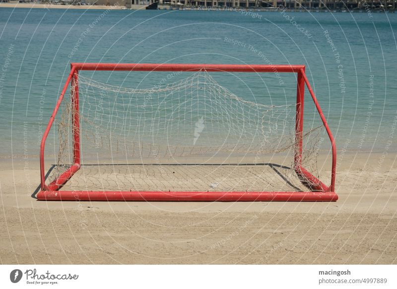 Overturned soccer goal on beach Foot ball Soccer Goal Sports Playing Playground Playing field Sports equipment Exterior shot soccer field Outdoors