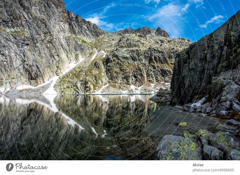 2022 06 04 CimaDasta granite and water mountain alpine nature italy landscape summer outdoor view alps lake green tourism valley sky blue scenic trentino travel