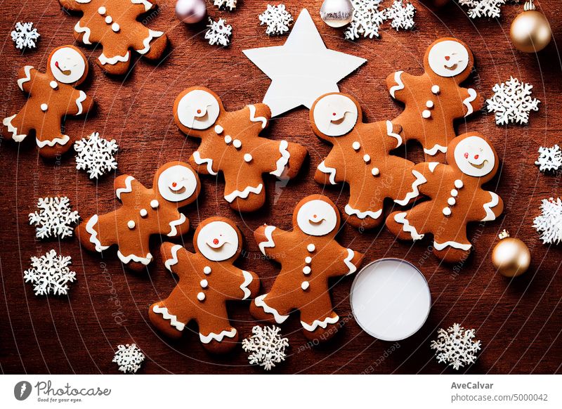 Christmas gingerbread cookies on dark cooking table background. Banner. Top view, copy space. New year concept.Making festive Christmas sweet cookies. Top view copy space