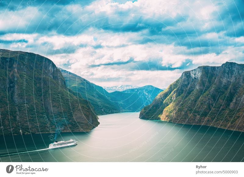 Sogn And Fjordane Fjord, Norway. Tourist Ship Ferry Boat Liner Floating In Amazing Fjord Sogn Og Fjordane. Summer Scenic View Of Famous Natural Attraction Landmark And Popular Destination In Summer